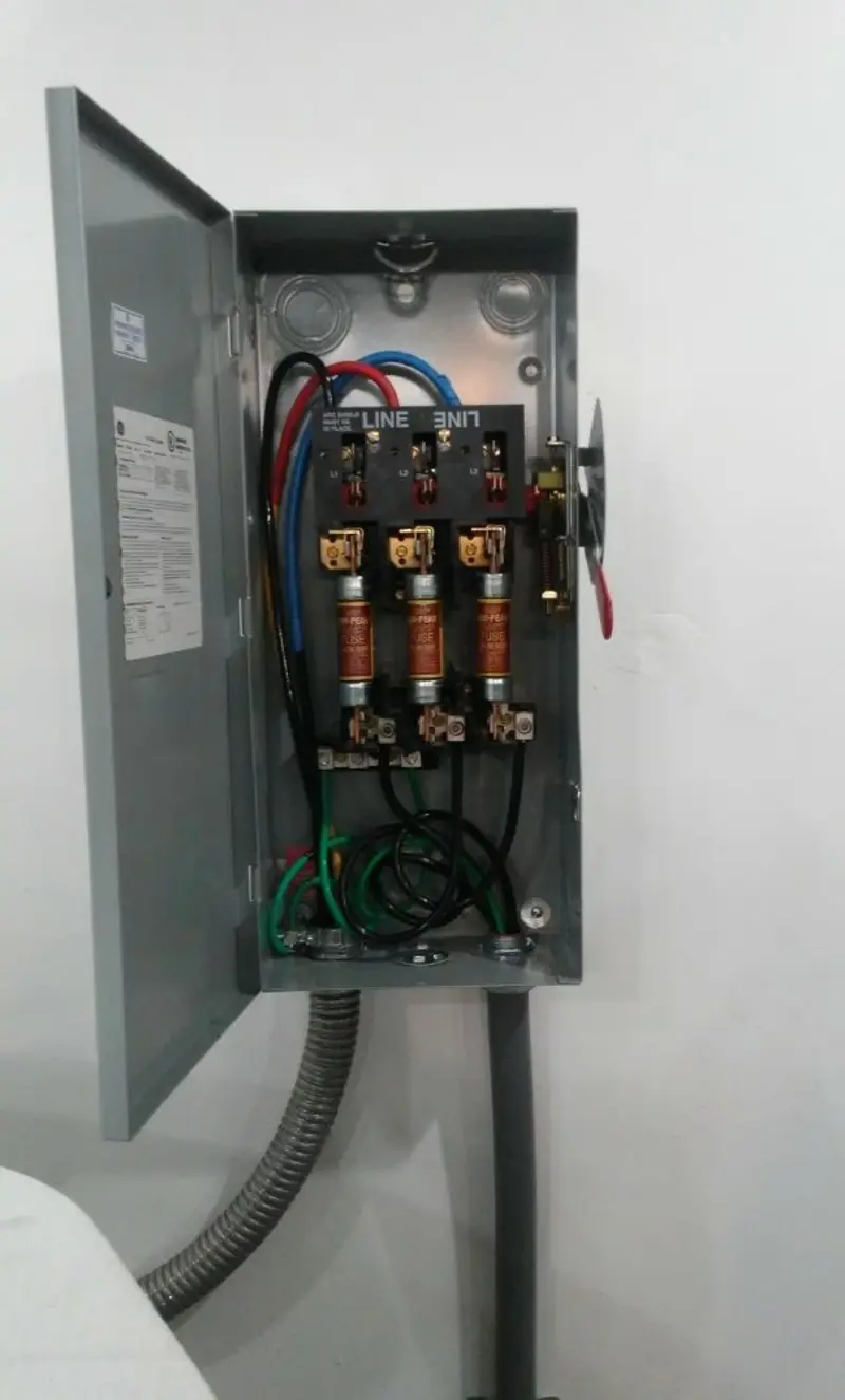 Three-phase disconnect switch installed for Smoke Detector Installation in Roxbury